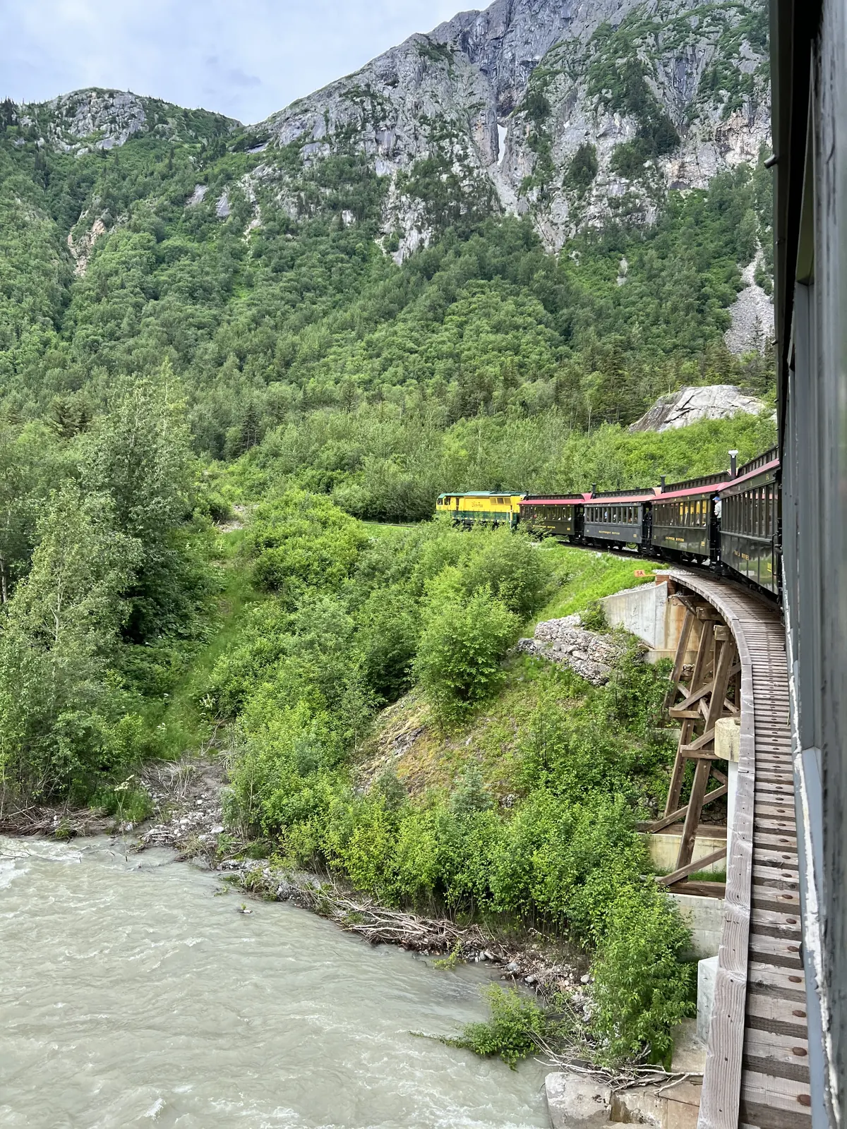 A White Pass and Yukon Route train climbing the mountainside above Skagway, Alaska