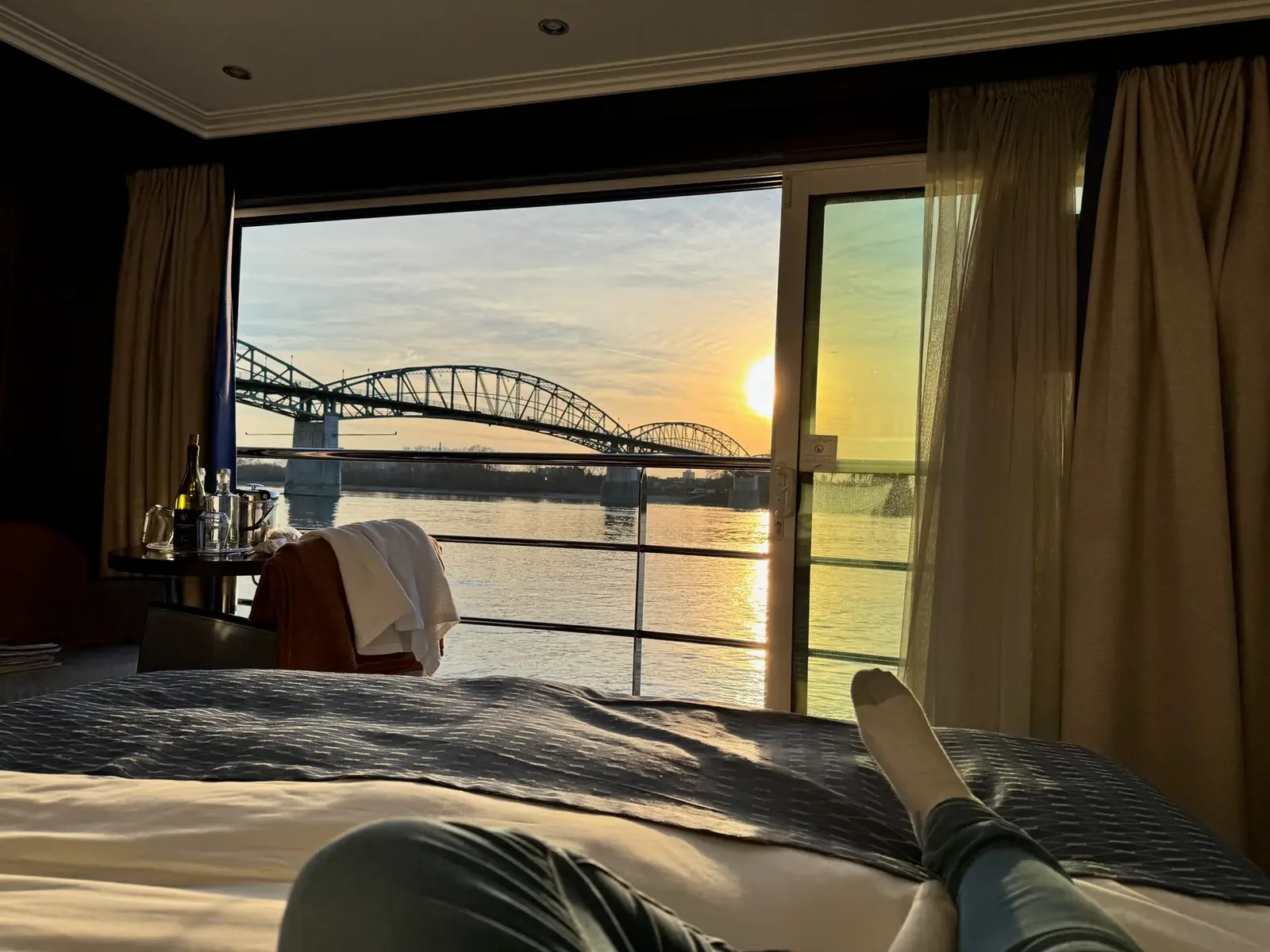Avalon River Cruise Bed looking out balcony on the danube