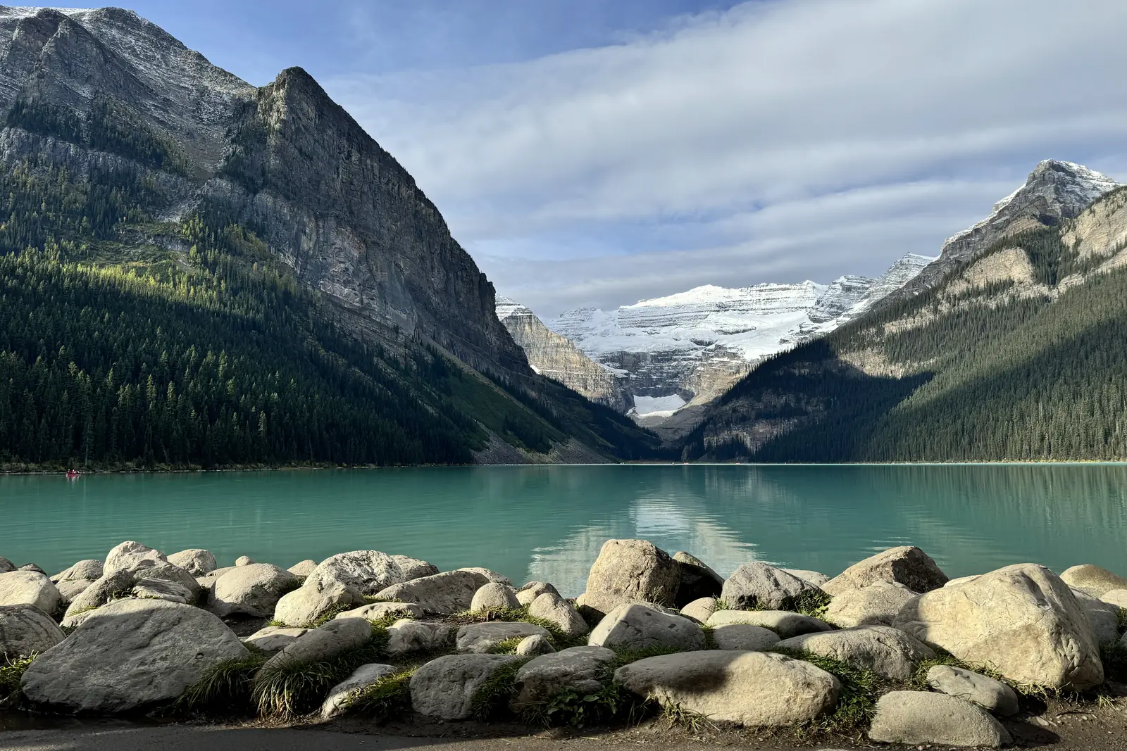 Lake Louise's turquoise water and glacier framed by the Canadian Rockies near Banff